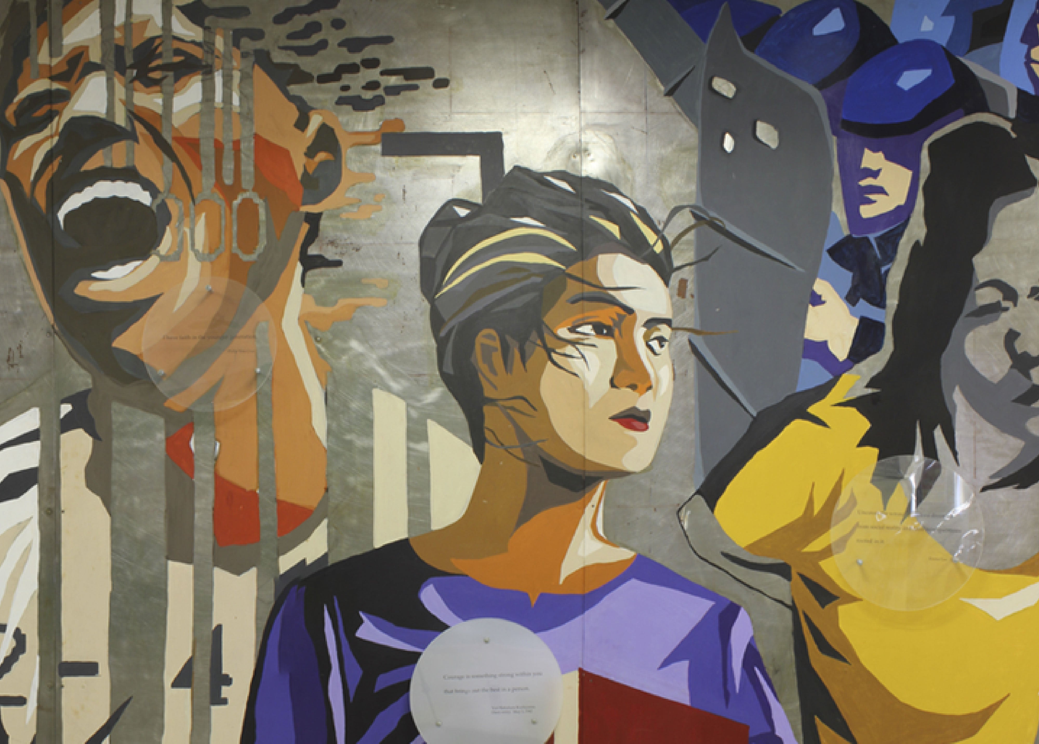 A mural featuring diverse individuals in a dynamic scene with bold colors and strong lines, representing the Asian American experience and activism.