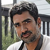 A headshot of Associate Professor Vishal Jugdeo