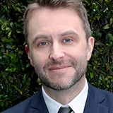 A headshot of UCLA alum Chris Hardwick