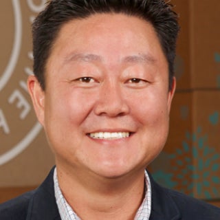A headshot of UCLA alum Brian Lee