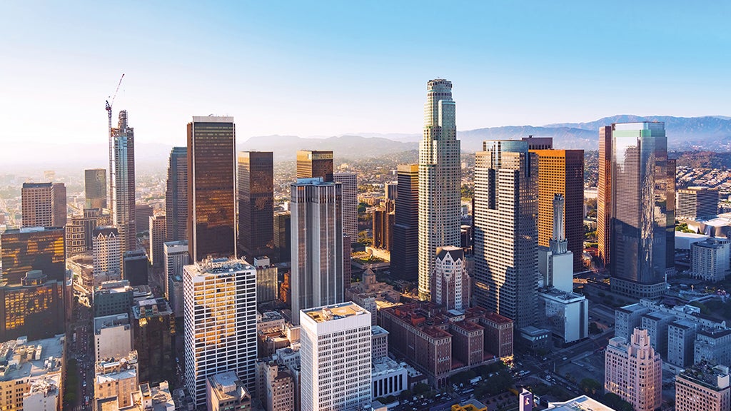 The afternoon sun reflects on the buildings of downtown L.A.